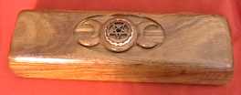 Closed view of hand-carved black bean wood box with Triple Goddess and Pentagram designs, for matching Triple Goddess Athame - a Handcrafted Ritual Treasure by MasterCraftsman ShadowSmith - click for enlarged view