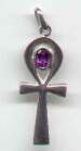Sterling silver Ankh symbol set with an Amethyst faceted stone in the eye of the Ankh.