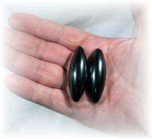 Holding Magnetic Hematite Singing Power Stones - Click for detail